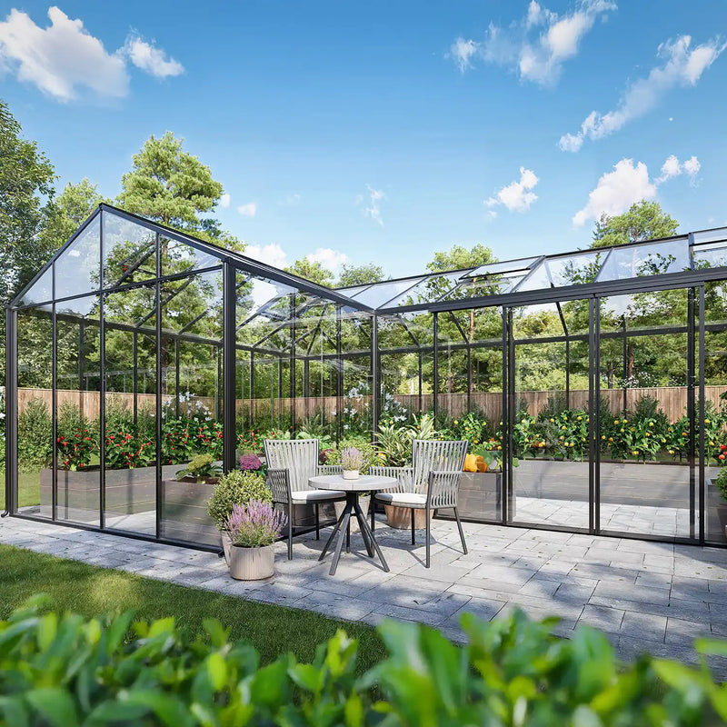 The Estate glass garden room used as an outdoor living space with furniture