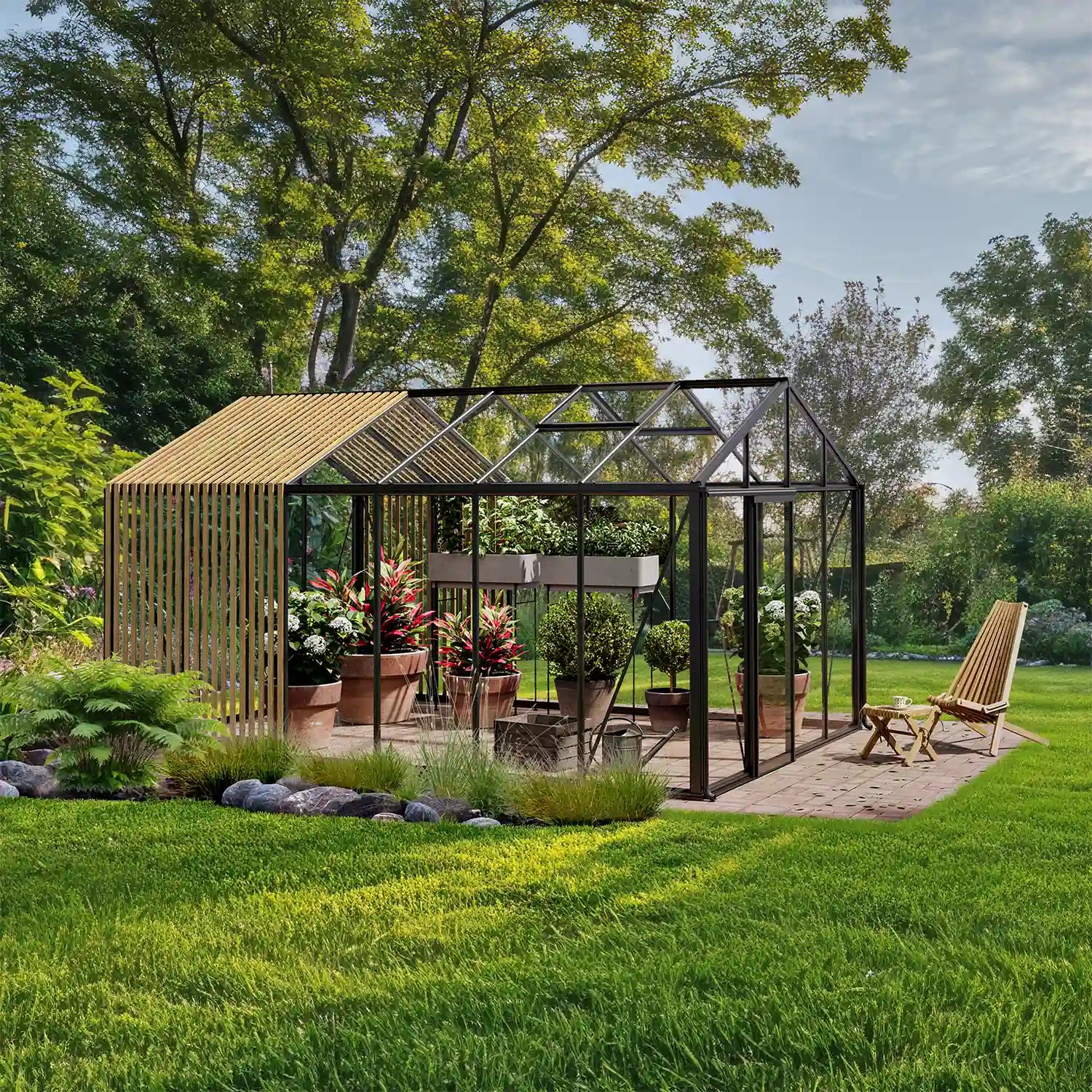 Interior of The Cottage glass greenhouse with couch and plants
