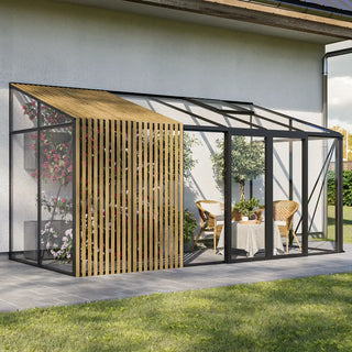 The Retreat glass greenhouse double sliding doors against garage wall