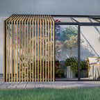 The Retreat glass greenhouse double sliding doors against garage wall