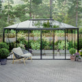 The Residence pyramid-roof glass greenhouse in backyard garden setting