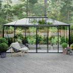 The Residence pyramid-roof glass greenhouse in backyard garden setting
